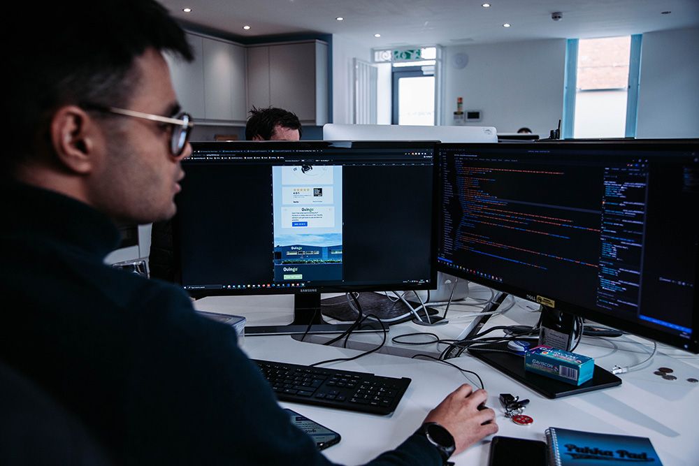 Two monitors on a desk